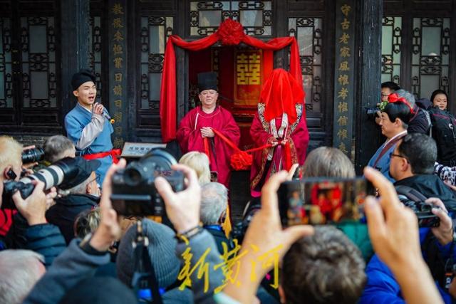 感受古街古韵！中外摄影家聚焦周村古商城