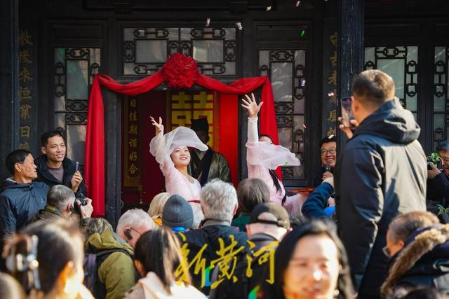 感受古街古韵！中外摄影家聚焦周村古商城