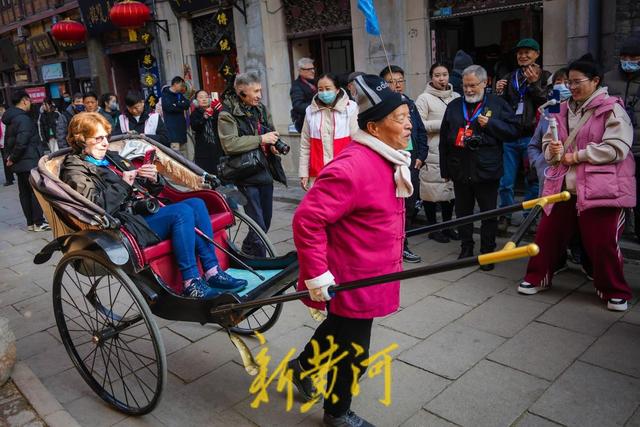 感受古街古韵！中外摄影家聚焦周村古商城