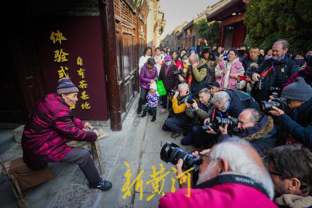 感受古街古韵！中外摄影家聚焦周村古商城