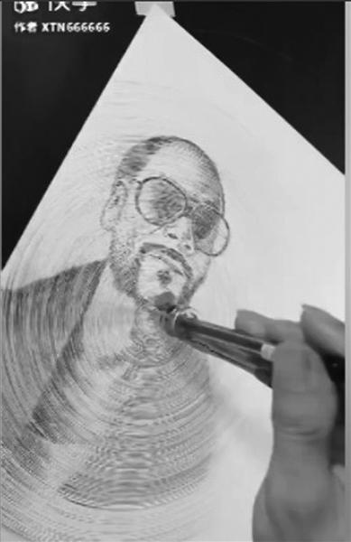 80后小伙用圆规“转”着画画走红网络