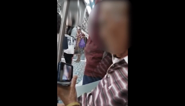 超重口,金表大叔在新加坡地铁上看露点黄片