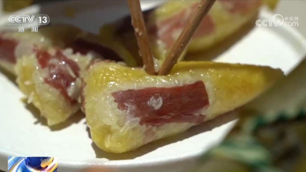 端午将至！龙舟竞渡展现速度激情 特色粽子满足食客味蕾